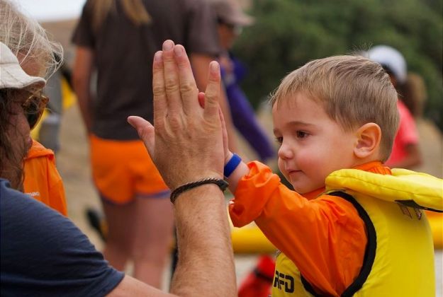 Young Boy High Fiving After Family Kayaking Tour | Kaikoura Kayaks | New Zealand